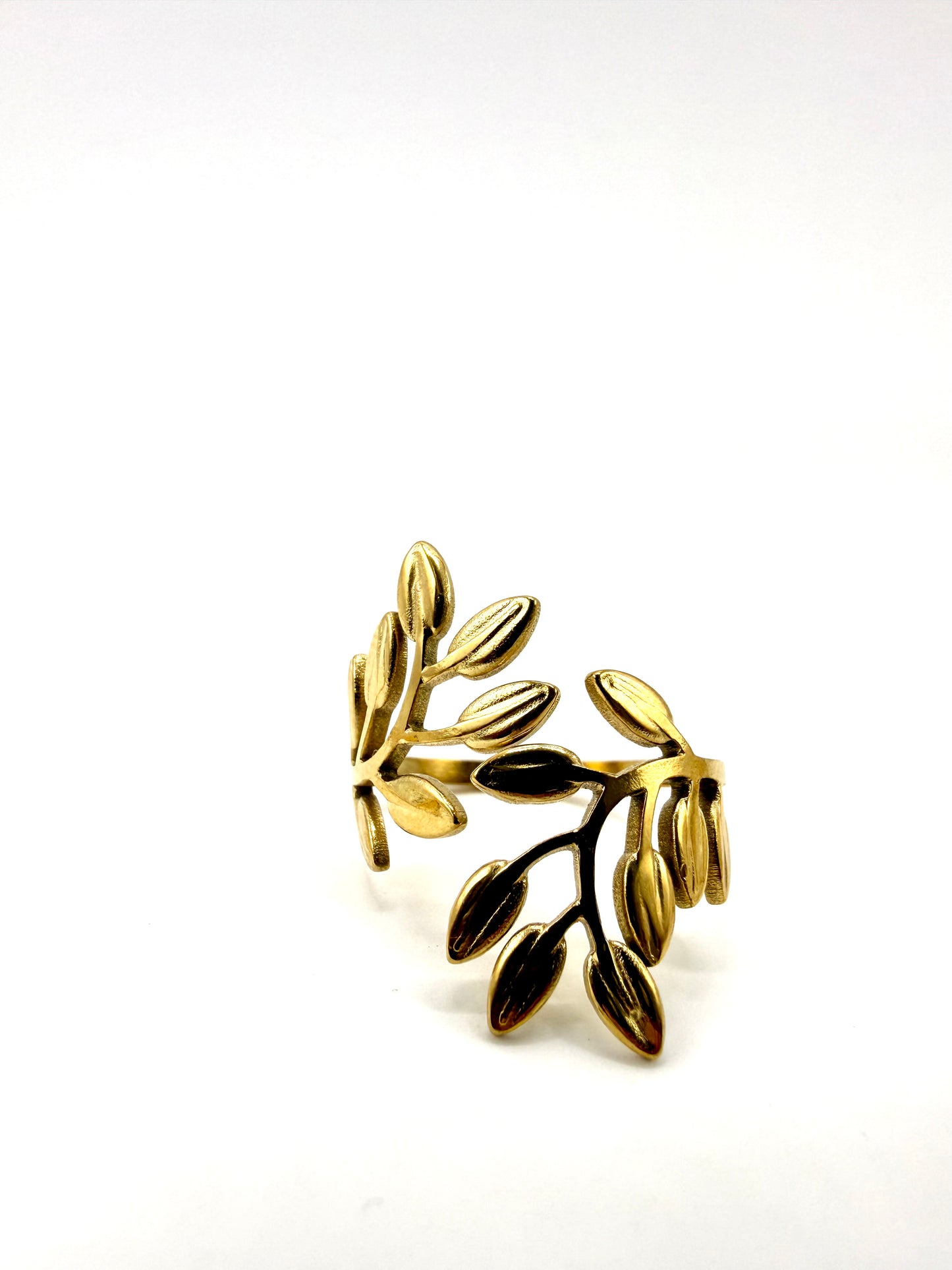 anillo ramas acero inoxidable bañado en oro de 14K