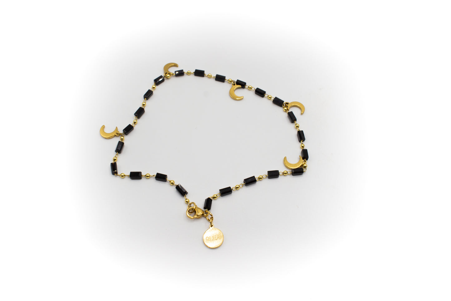 Fußkettchen aus goldfarbenem Edelstahl und schwarzem Acryl mit Monden