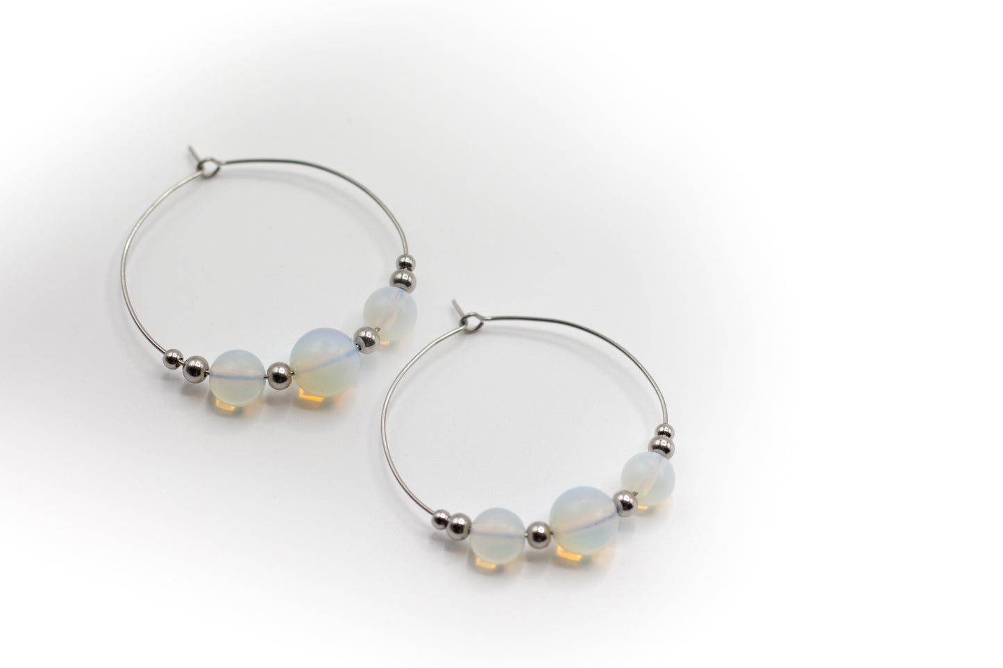 Creolen aus opal- und silberfarbenem Edelstahl