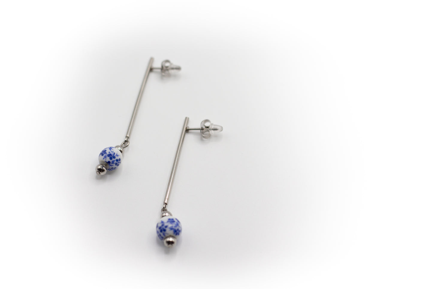 pendientes de palo y acero inoxidable color plata con cerámica china