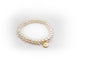 Bracelet élastique avec perles de culture naturelles semi-rondes