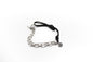 pulsera de acero inoxidable y cordón negro