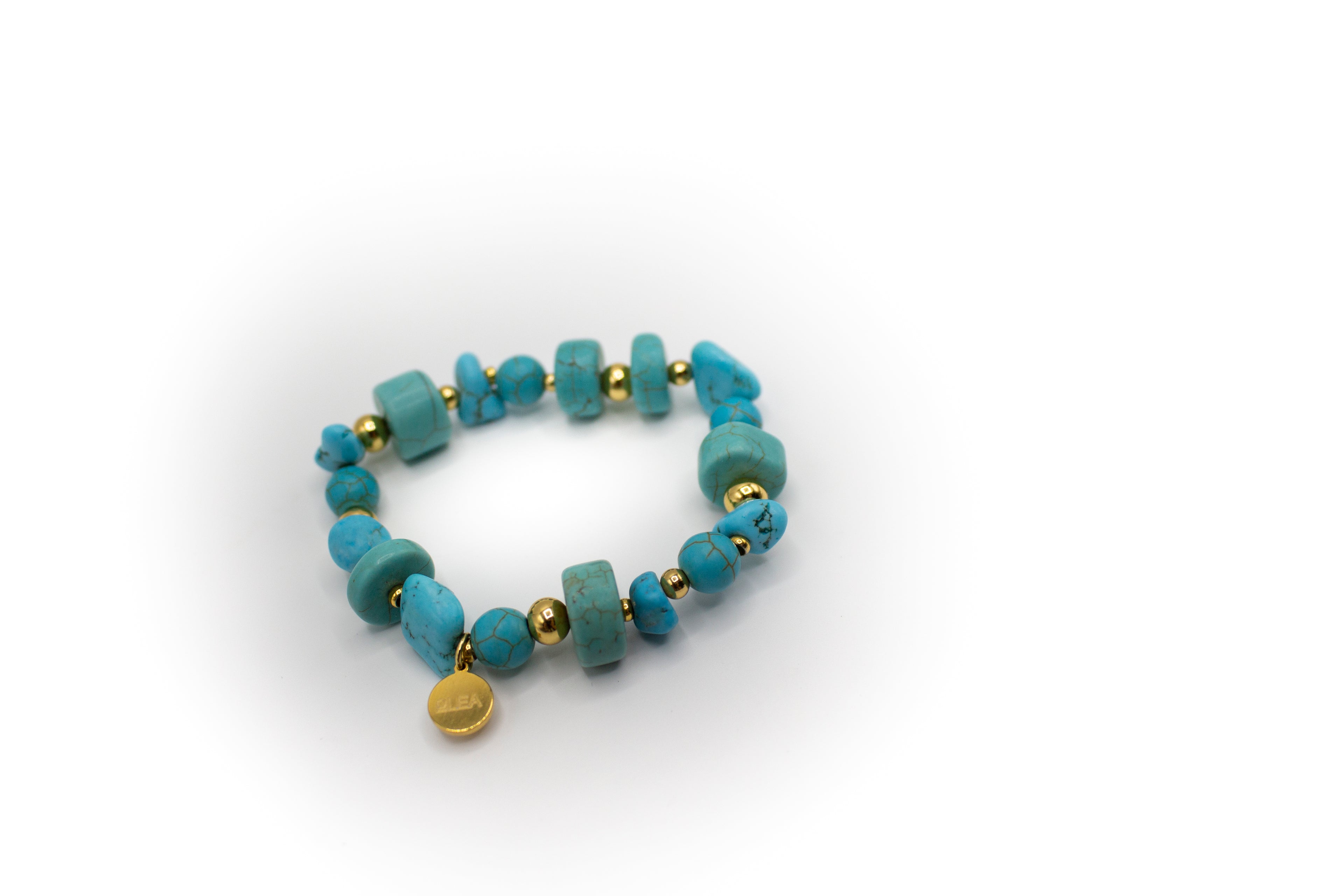 pulsera de piedra natural turquesa con separadores acero inoxidable color oro