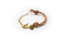 pulsera cuero natural y mitad cadena de acero inoxidable color oro
