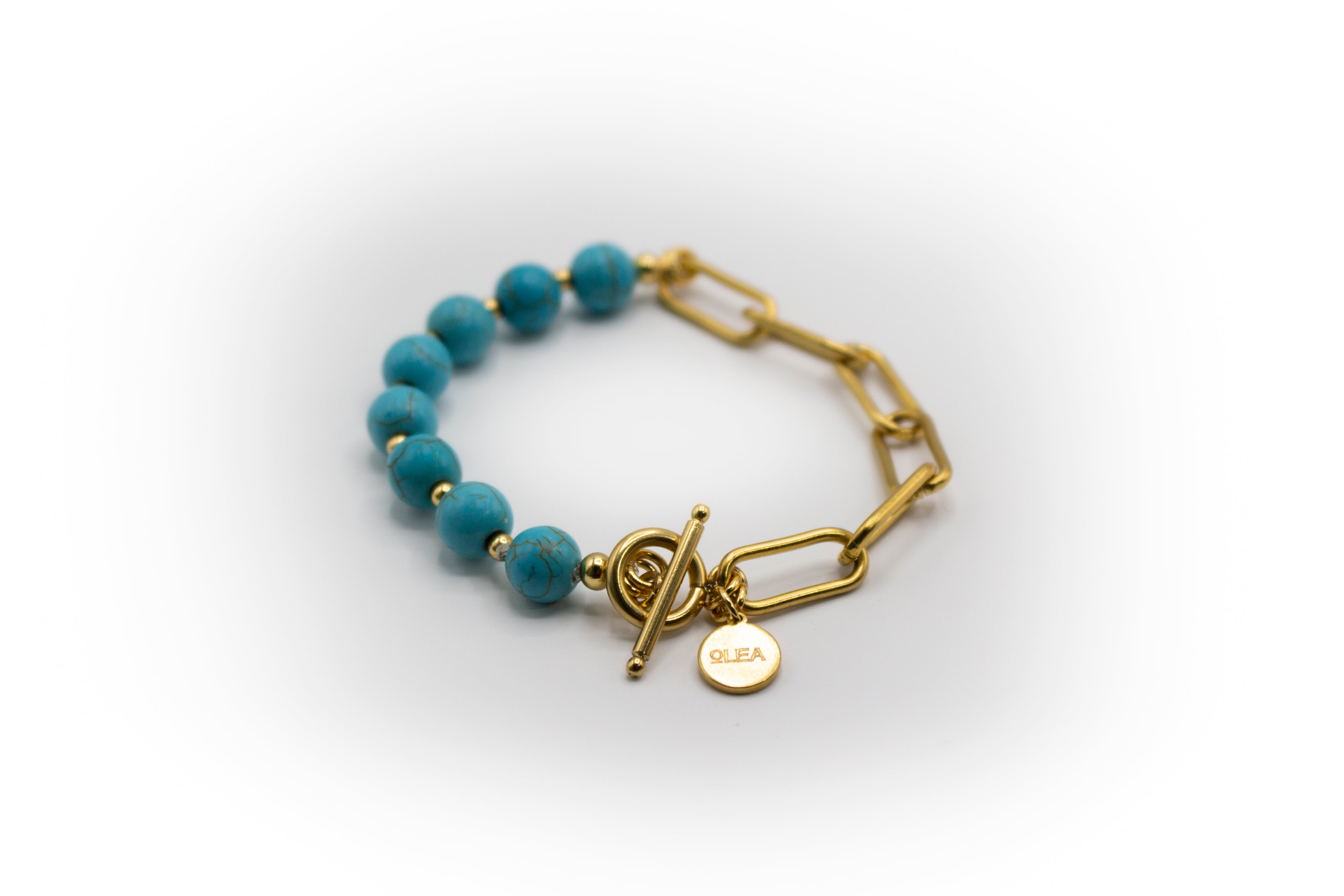 pulsera mitad cadena acero inoxidable bañado en oro de 14K con piedra natural turquesa con separadores
