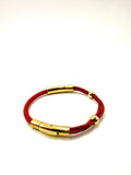 pulsera dos cierres cuero rojo y acero inoxidable bañado en oro de 14K