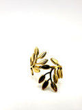 anillo ramas acero inoxidable bañado en oro de 14K
