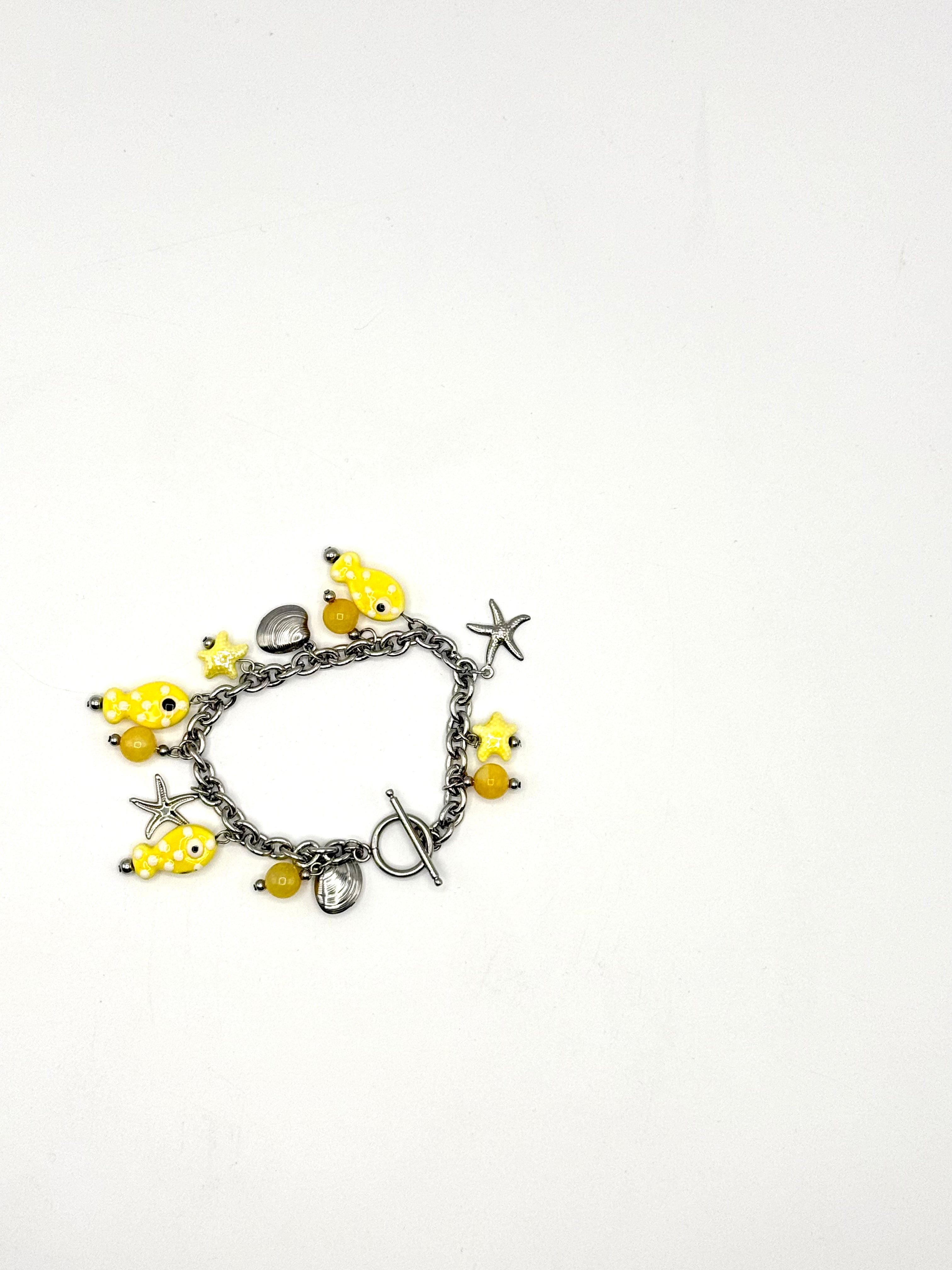 pulsera peces amarillos de ceramica, ágata amarilla y acero inoxidable