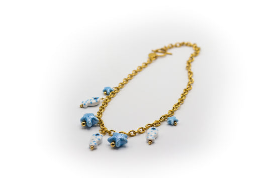 Kurze Halskette aus goldfarbenem Edelstahl und Keramik