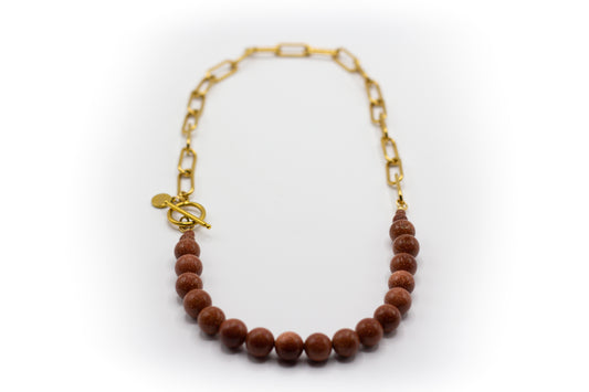 Kurze Halskette aus goldfarbenem Edelstahl und natürlichem Aventurinstein