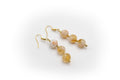 pendientes gancho de acero inoxidable color oro con piedra natural citrino