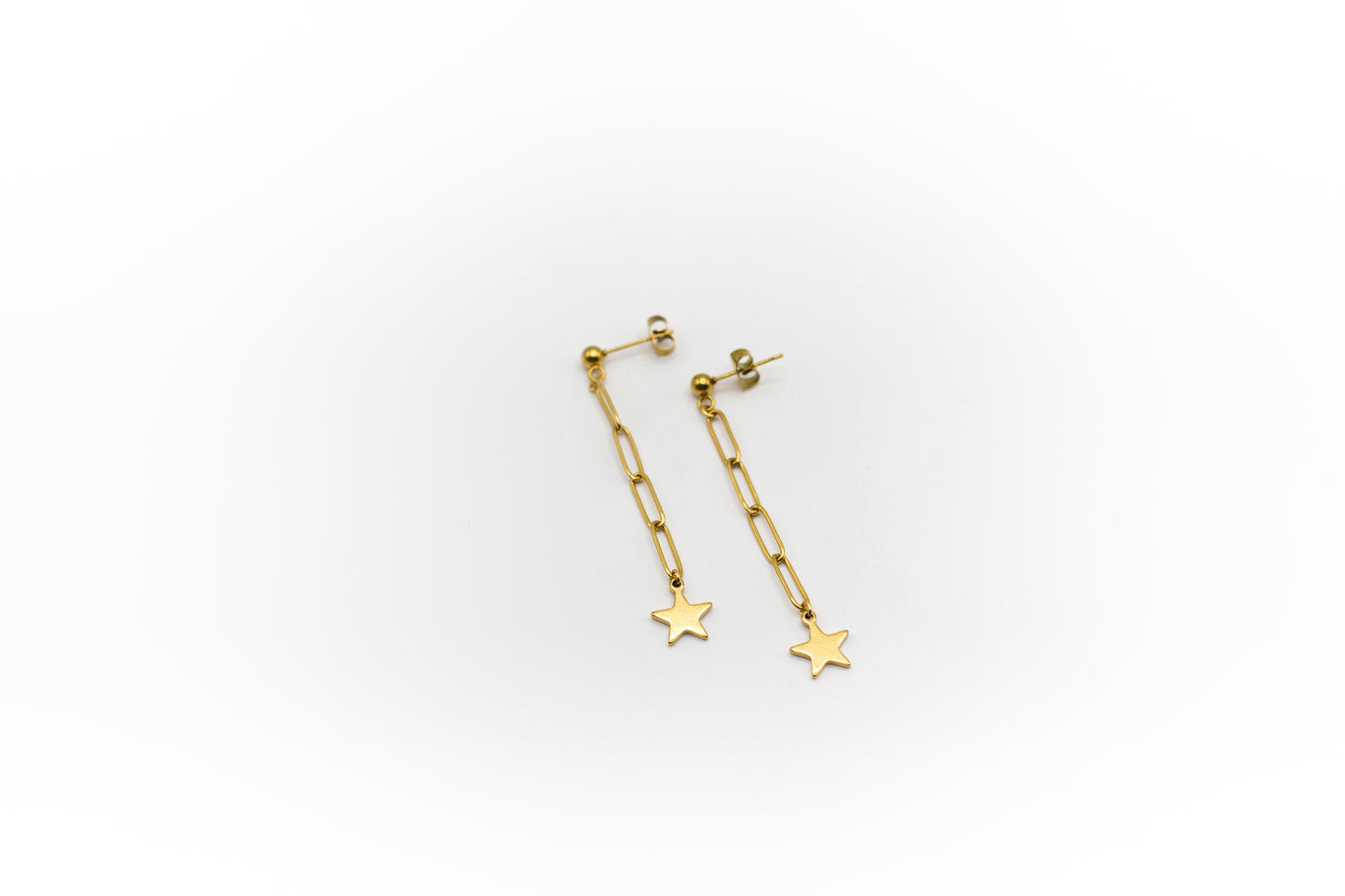 Goldfarbener Sternknopf und Kette aus Edelstahl