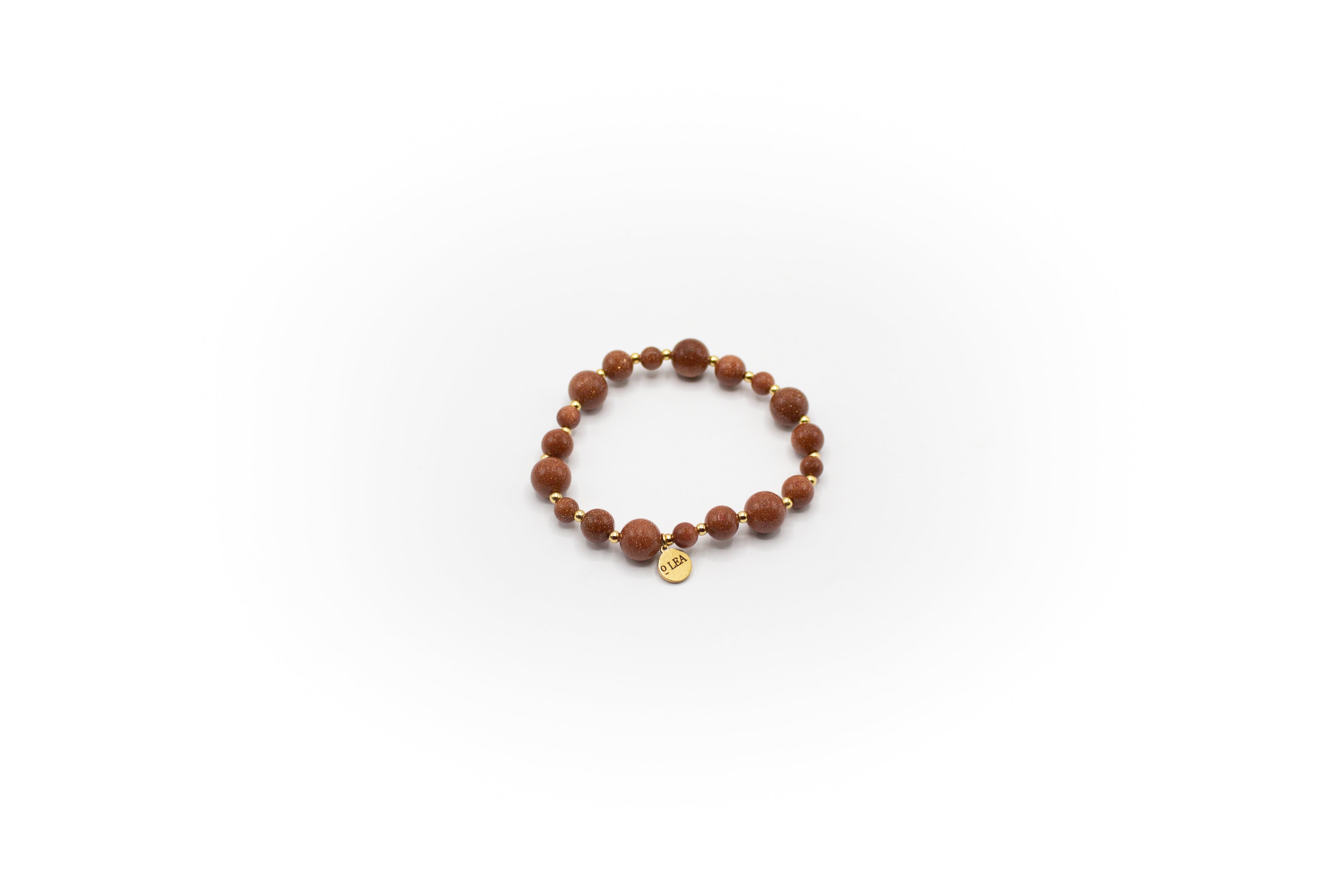 pulsera elástica piedra natural aventurina y separadores de acero inoxidable color oro