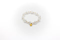 pulsera elástica de piedra natural cuarzo craqueado y acero inoxidable color oro
