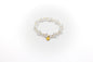 pulsera elástica de piedra natural cuarzo craqueado y acero inoxidable color oro